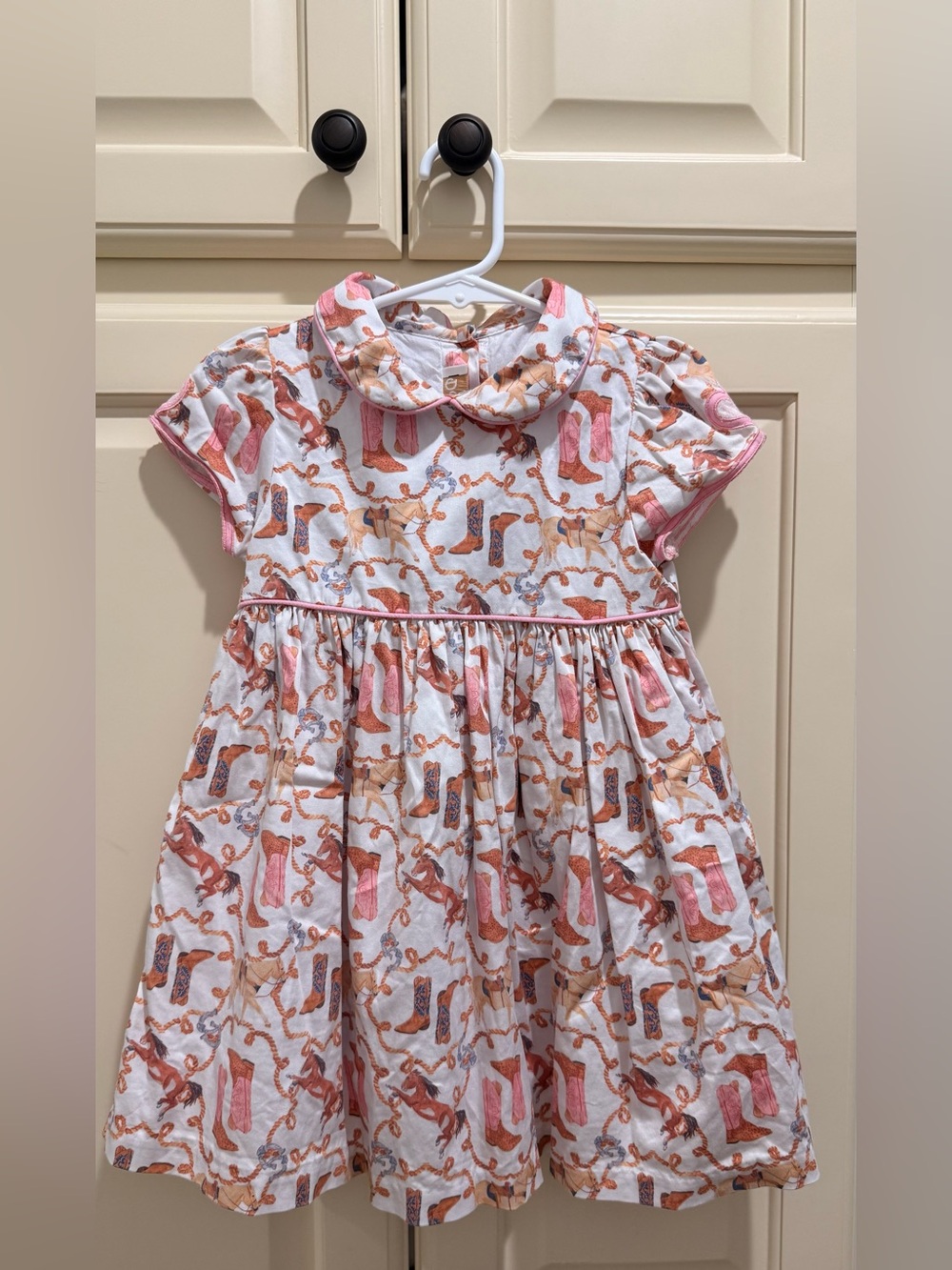 Dondolo Toddler Girls White Dress with Pink & Brown Cowboy Boot Print